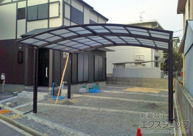 大阪府高石市ののカーポート レイナツインポート 積雪〜20cm対応+収納式物干しセット 2本入り 施工例