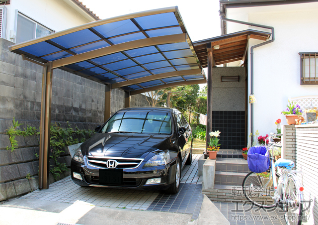 大阪府阪南市のLIXIL リクシル（トステム）のカーポート カーブポートシグマIII 延長 積雪〜20cm対応 施工例