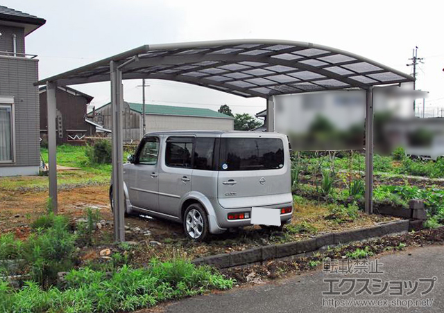 兵庫県加東市のLIXIL リクシル（トステム）のカーポート カーブポートシグマIII ワイド 積雪〜30cm対応+収納式物干し 標準 2本入 施工例