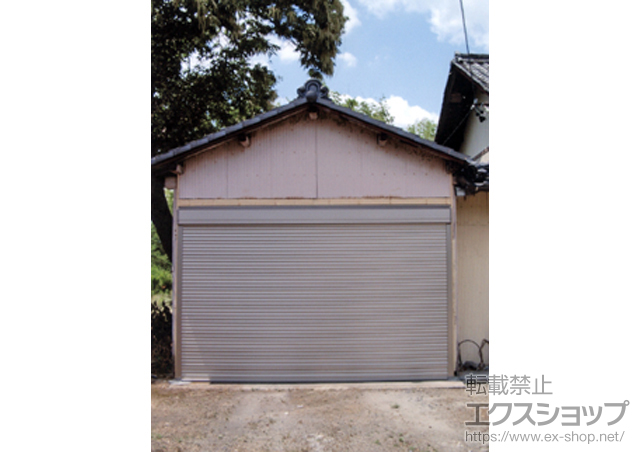 岐阜県多治見市のLIXIL リクシル（トステム）のガレージシャッター ガレージシャッタークワトロ 電動式 外部付タイプ 施工例