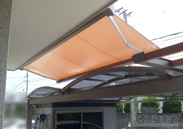 福岡県福岡市のLIXIL リクシル（トステム）のオーニング・日よけ 彩風CR型 電動式　※スクリーン特注仕様(2.5m) 施工例