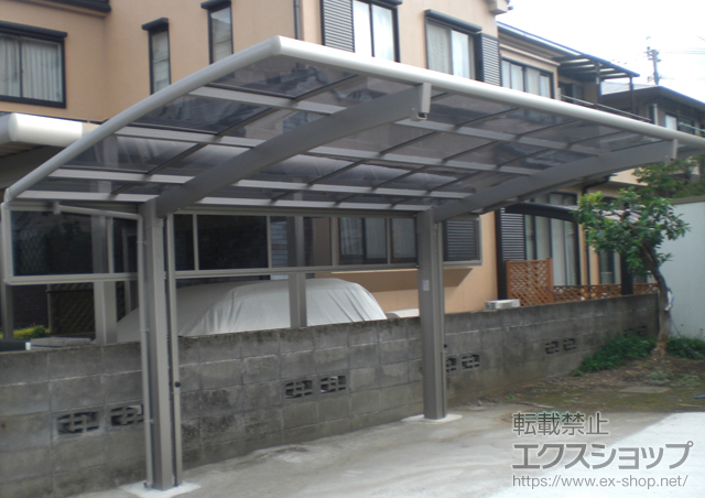 熊本県熊本市のLIXIL リクシル（トステム）のカーポート カーブポートシグマIII 耐風圧強度仕様 積雪〜30cm対応＋カーブポートシグマIII用 サイドパネル 施工例