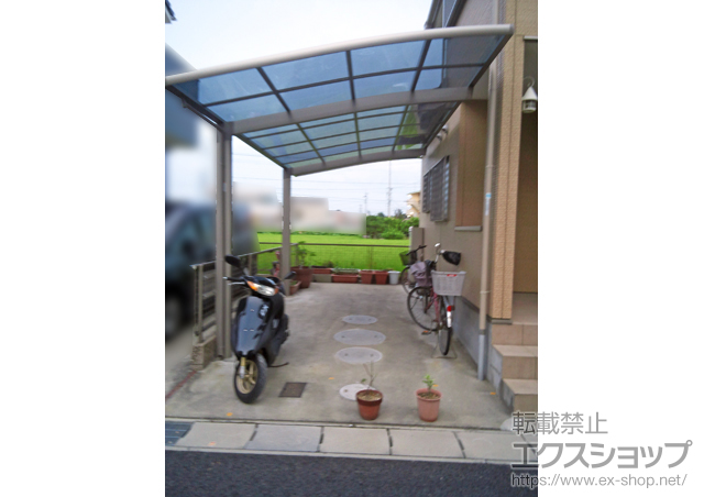 愛知県西春日井郡豊山町のLIXIL リクシル（トステム）のカーポート カーブポートシグマIII 積雪〜20cm対応 施工例