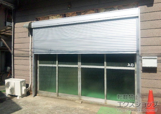 東京都大田区のLIXIL リクシル（トステム）のガレージシャッター ガレージシャッタークワトロ 電動式 外部付タイプ 施工例