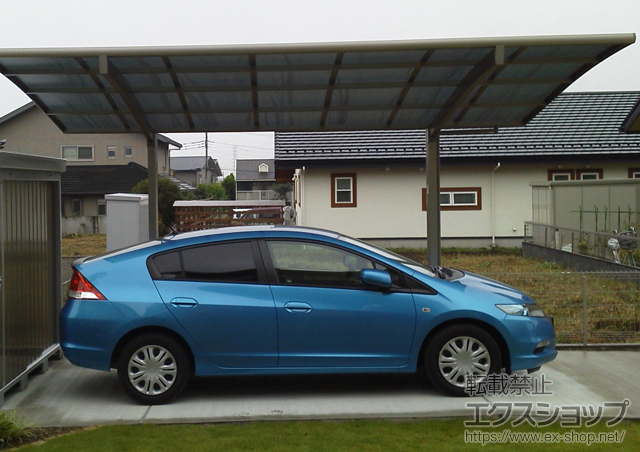 栃木県塩谷郡高根沢町のLIXIL リクシル（トステム）のカーポート カーブポートシグマIII 積雪〜20cm対応 施工例