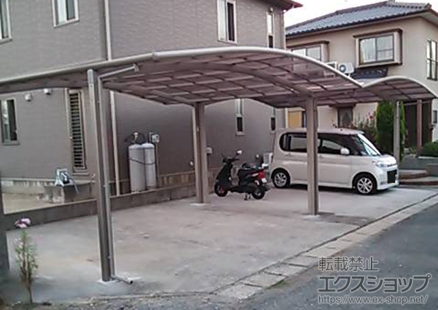 大分県中津市のLIXIL リクシル（トステム）のカーポート カーブポートシグマIII ワイド 積雪〜20cm対応 施工例
