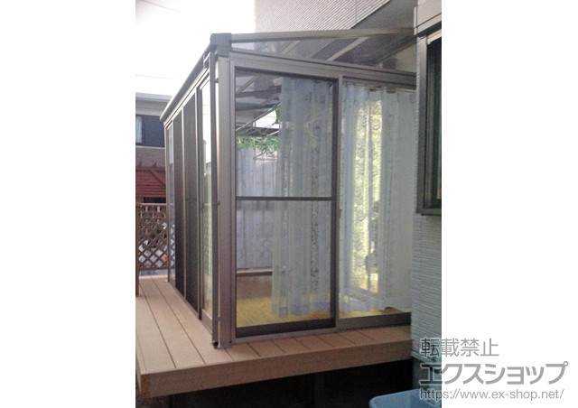 福岡県太宰府市のLIXIL リクシル（トステム）のテラス囲い・サンルーム ほせるんですII F型 人工木デッキ上納まり 積雪〜20cm対応 施工例