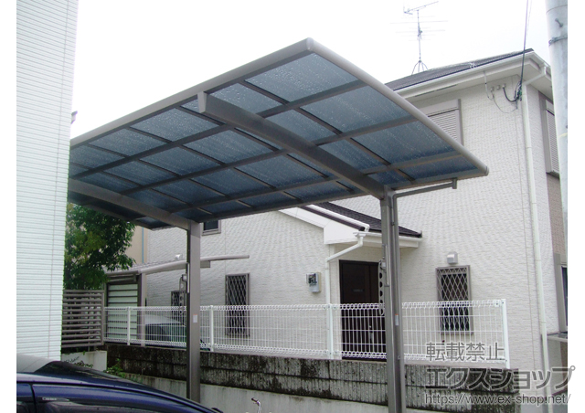 兵庫県宝塚市のLIXIL リクシル（トステム）のカーポート カーブポートシグマIII 積雪〜20cm対応＋収納式物干し　標準タイプ　2本入 施工例