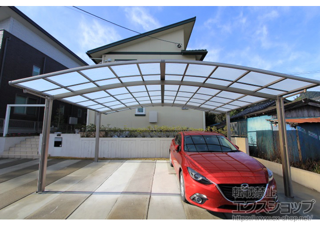 鹿児島県姶良市のLIXIL リクシル（トステム）のカーポート カーブポートシグマIII ワイド 積雪〜20cm対応 施工例