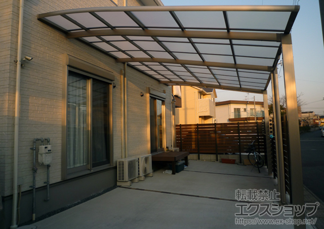 福岡県北九州市のLIXIL リクシル（トステム）のカーポート ルーフポートシグマIII 延長 積雪〜20cm対応＋収納式物干し 標準タイプ 2本入り 施工例