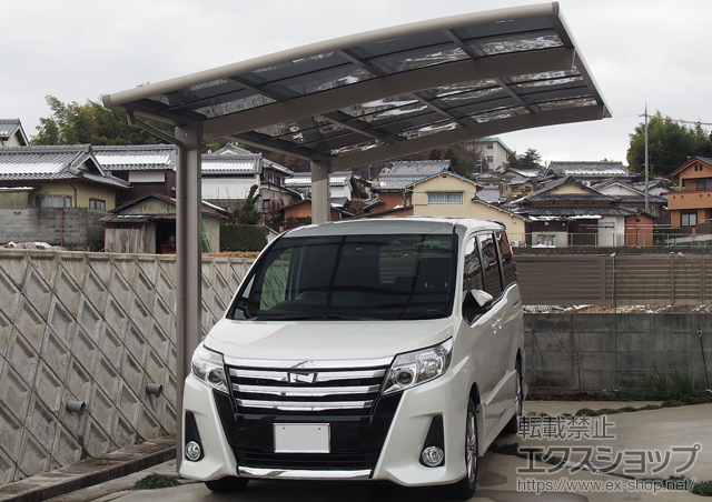 京都府亀岡市のLIXIL リクシル（トステム）のカーポート カーブポートシグマIII 積雪〜20cm対応 施工例