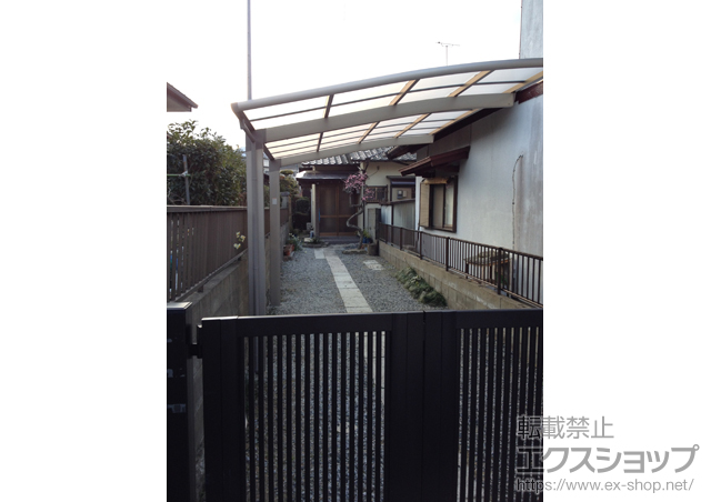 福岡県糟屋郡須恵町のLIXIL リクシル（トステム）のカーポート カーブポートシグマIII 積雪〜20cm対応 施工例