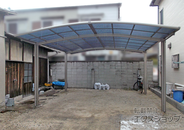 大阪府大阪市のLIXIL リクシル（トステム）のカーポート カーブポートシグマIII ワイド 積雪〜20cm対応 施工例