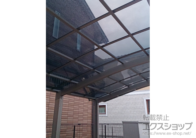 東京都稲城市のLIXIL リクシル（トステム）のカーポート カーブポートシグマIII 延長 積雪〜20cm対応 施工例