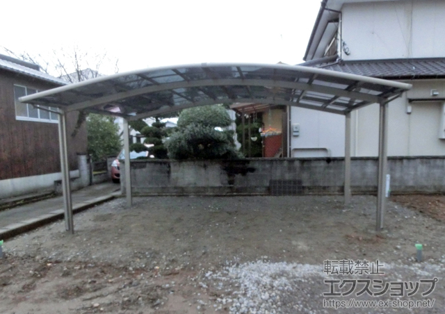 大分県中津市のLIXIL リクシル（トステム）のカーポート カーブポートシグマIII ワイド 積雪〜20cm対応＋屋根材ホルダー 施工例