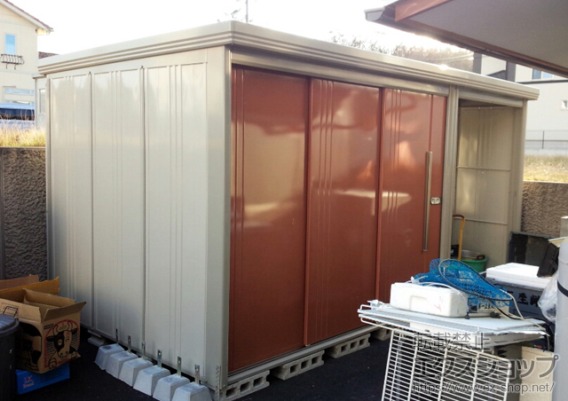 鳥取県鳥取市のの物置・屋外倉庫 Mr.ストックマン プラスアルファ 一般型（TP-4022）＋別売棚NHT-S22W×1 施工例