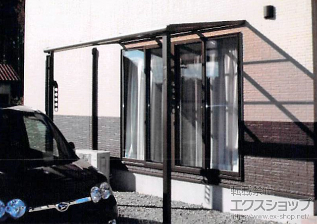 福島県相馬市のLIXIL リクシル（トステム）のテラス屋根 ライザーテラスII F型 テラスタイプ 単体 積雪〜20cm対応＋壁付け物干し 施工例