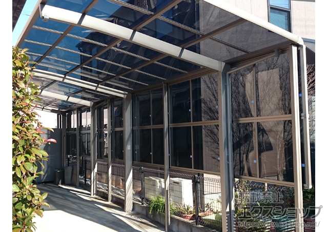 福岡県糸島市のLIXIL リクシル（トステム）のカーポート カーブポートシグマIII 縦連棟 積雪〜20cm対応＋サイドパネル 2段 施工例