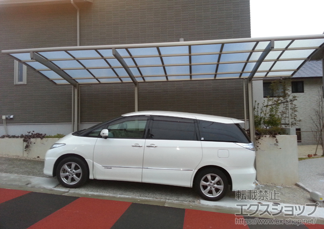 福岡県筑紫野市のLIXIL リクシル（トステム）のカーポート カーブポートシグマIII 延長 積雪〜20cm対応＋着脱式サポート ロング柱28用 1本入り×2セット 施工例