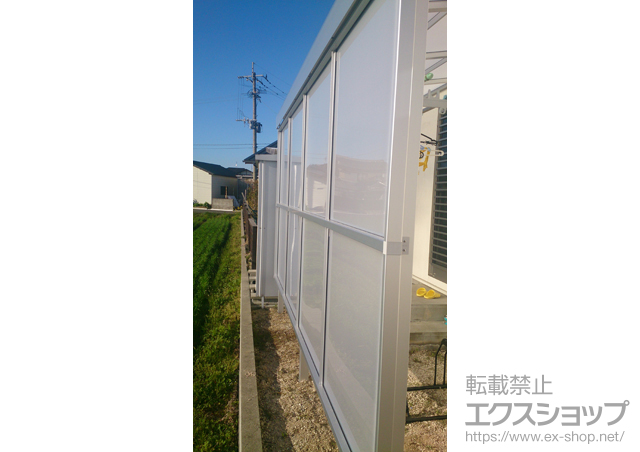 福岡県三潴郡大木町のLIXIL リクシル（トステム）のテラス屋根 ライザーテラスII F型 テラスタイプ 単体 積雪〜20cm対応+吊り下げ物干し 標準2本入り+前面スクリーン2段 施工例