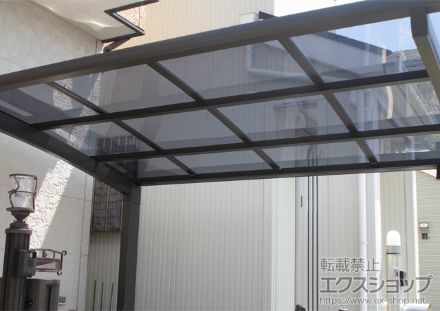 大阪府富田林市のLIXIL リクシル（トステム）のサイクルポート・駐輪場 カーブポートシグマIII ミニ 積雪〜20cm対応 施工例