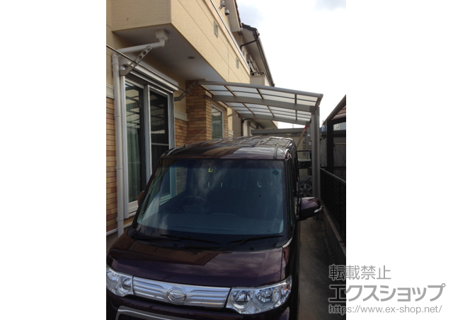 愛知県知立市のLIXIL リクシル（トステム）のカーポート カーブポートシグマIII 積雪〜20cm対応＋収納式物干し 標準タイプ 2本入り 施工例