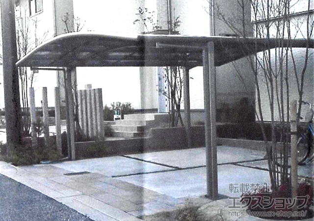 大阪府箕面市のLIXIL リクシル（トステム）のカーポート カーブポートシグマIII ワイド 積雪〜20cm対応 施工例