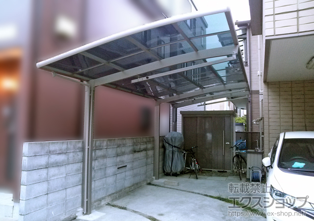 埼玉県蕨市のLIXIL リクシル（トステム）のカーポート カーブポートシグマIII 延長 積雪〜20cm対応+カーブポートシグマIII用 収納式サポート ロング柱23用 施工例