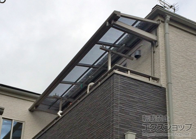 大阪府摂津市のLIXIL リクシル（トステム）のバルコニー・ベランダ屋根 ライザーテラスII F型 ルーフタイプ 単体 積雪〜20cm対応 施工例