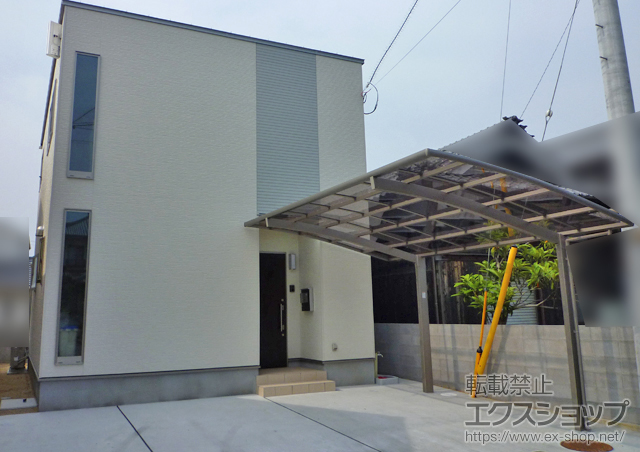 愛媛県松山市のLIXIL リクシル（トステム）のカーポート カーブポートシグマIII 積雪〜20cm対応 施工例