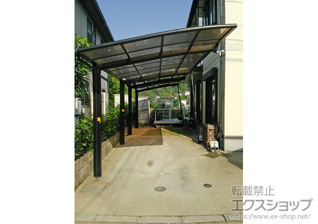 広島県東広島市のLIXIL リクシル（トステム）のカーポート カーブポートシグマIII 積雪〜20cm対応 施工例