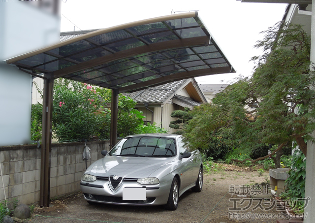 栃木県足利市のLIXIL リクシル（トステム）のカーポート カーブポートシグマIII 積雪〜20cm対応＋着脱式サポート柱　ロング柱23用　1本入 施工例