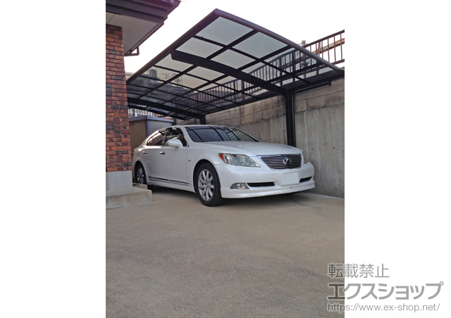 長崎県佐世保市のLIXIL リクシル（トステム）のカーポート カーブポートシグマIII 積雪〜20cm対応 施工例