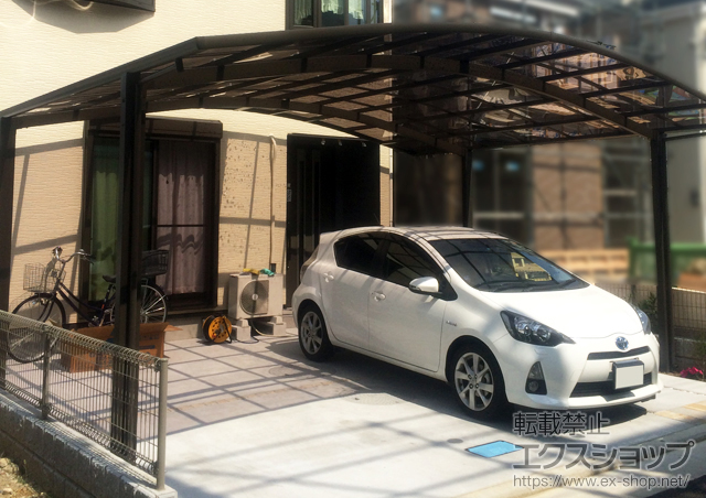 大阪府八尾市のLIXIL リクシル（トステム）のカーポート カーブポートシグマIII ワイド 積雪〜20cm対応 施工例