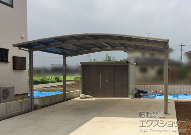 埼玉県北本市のLIXIL リクシル（トステム）のカーポート カーブポートシグマIII ワイド 積雪〜20cm対応＋屋根材ホルダー 50タイプ用 施工例