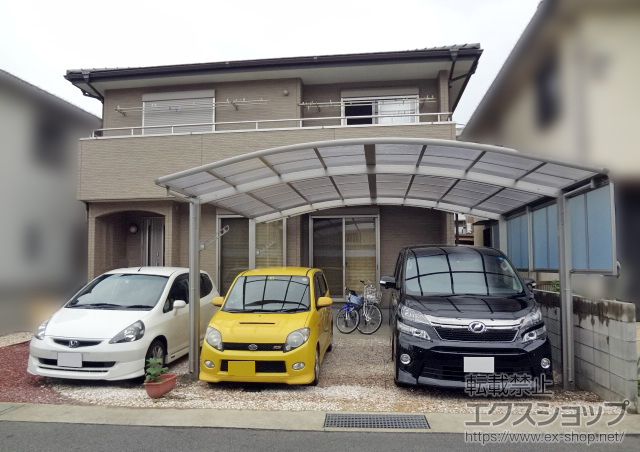 徳島県徳島市ののカーポート レイナツインポートグラン　積雪〜20cm対応+サイドパネル+水平式物干し（テラス柱用） 2本入り 施工例