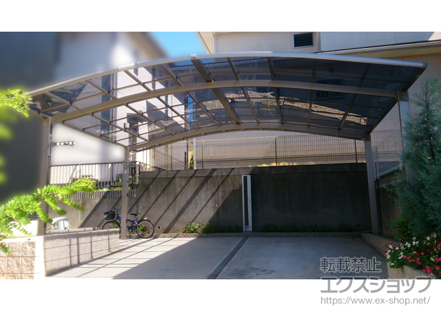 千葉県木更津市のLIXIL リクシル（トステム）のカーポート カーブポートシグマIII ワイド 積雪〜20cm対応+収納式物干し（2本入り） 施工例