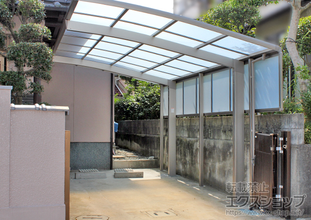 愛媛県松山市のLIXIL リクシル（トステム）のカーポート カーブポートシグマIII 積雪〜20cm対応+サイドパネル 施工例