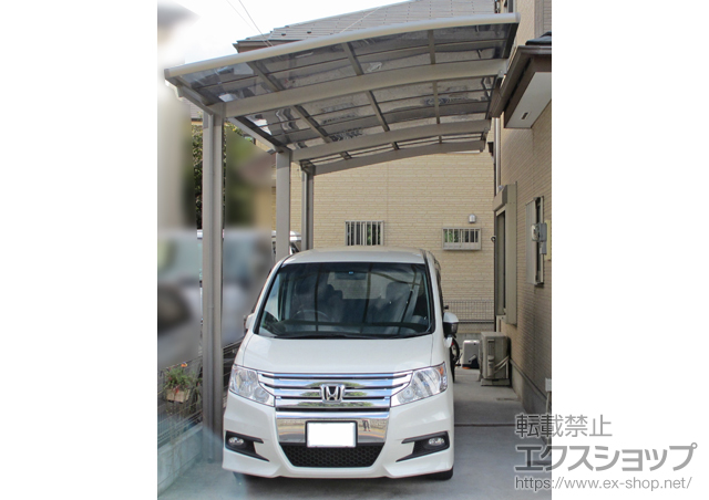 東京都府中市のLIXIL リクシル（トステム）のカーポート カーブポートシグマIII 延長 積雪〜30?対応＋着脱式サポート柱　ロング28用 施工例