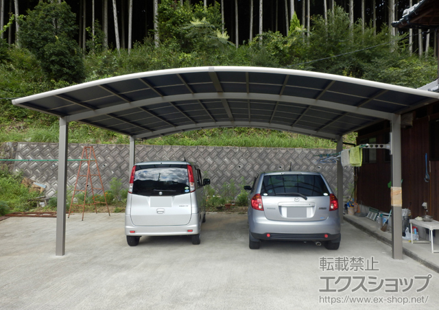 兵庫県多可郡多可町のLIXIL リクシル（トステム）のカーポート カーブポートシグマIII ワイド 積雪〜20cm対応+収納式物干し　標準　2本入り 施工例