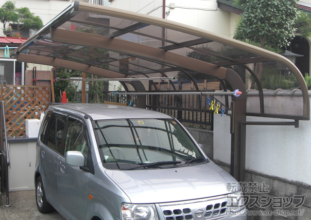 群馬県北群馬郡のLIXIL リクシル（トステム）のカーポート テールポートシグマIII 積雪〜20cm対応＋収納式物干し 標準 2本入り×1セット 施工例