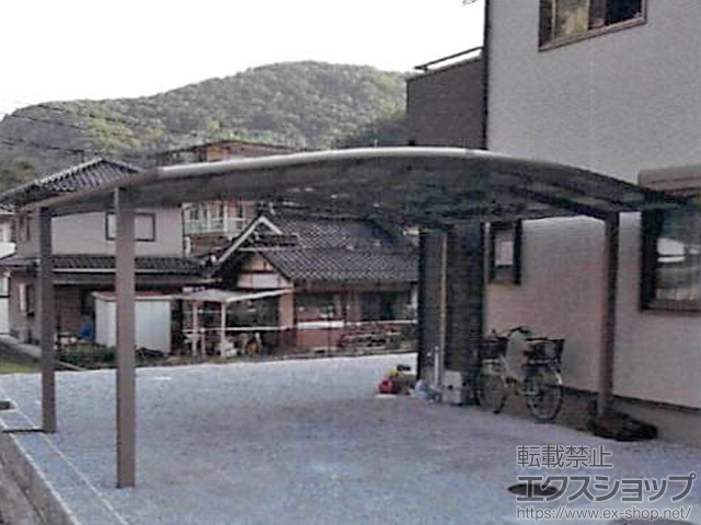 岡山県新見市のLIXIL リクシル（トステム）のカーポート カーブポートシグマIII ワイド 積雪〜20cm対応 施工例