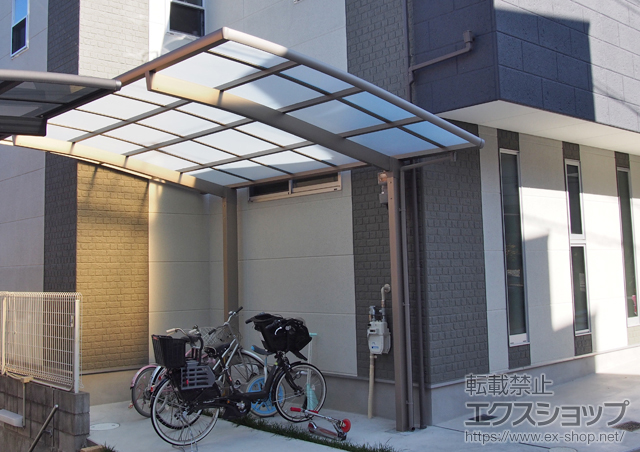 大阪府枚方市のLIXIL リクシル（トステム）のカーポート カーブポートシグマIII 積雪〜20cm対応 施工例