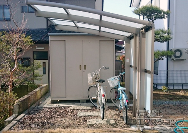 福島県郡山市のLIXIL リクシル（トステム）のカーポート カーブパークシグマIII パネル1面囲い 積雪〜20cm対応 施工例