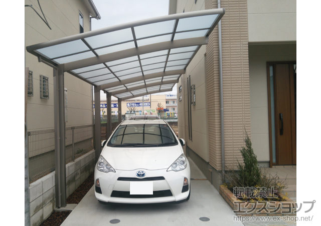 大阪府枚方市のLIXIL リクシル（トステム）のカーポート カーブポートシグマIII 縦連棟 積雪〜20cm対応 施工例