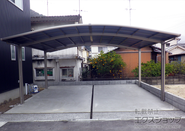 大分県別府市のLIXIL リクシル（トステム）のカーポート カーブポートシグマIII ワイド 積雪〜20cm対応 施工例