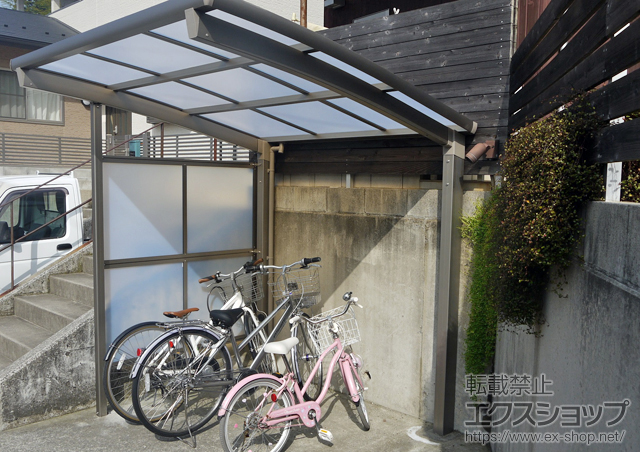 広島県東広島市のLIXIL リクシル（トステム）のサイクルポート・駐輪場 カーブパークシグマIII オープンタイプ 積雪〜20cm対応＋側面パネル1面囲い 施工例