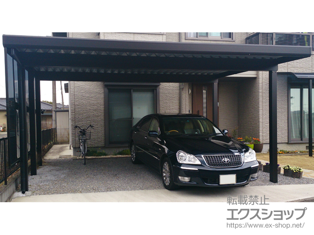 栃木県矢板市ののカーポート レオンポートneo 2台用 標準鼻隠し 角柱4本仕様 積雪〜50cm対応＋サイドパネル 台形枠付き<平板タイプ> 施工例