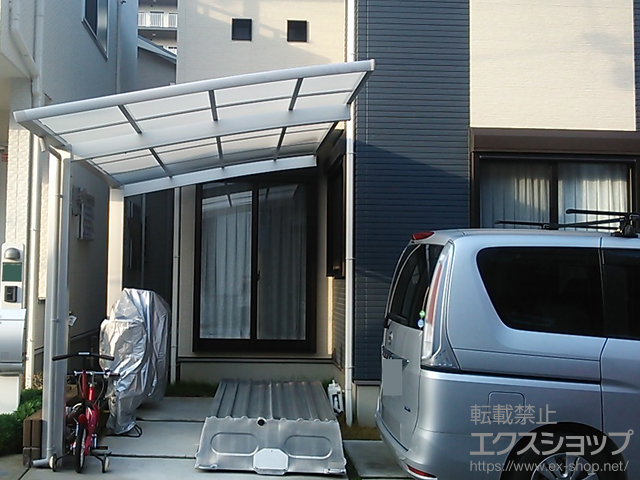 大阪府和泉市ののカーポート カムフィエース 積雪〜20cm対応＋車止めバーセット　奥行き43用　側面パネル無し用　標準タイプ×1セット 施工例