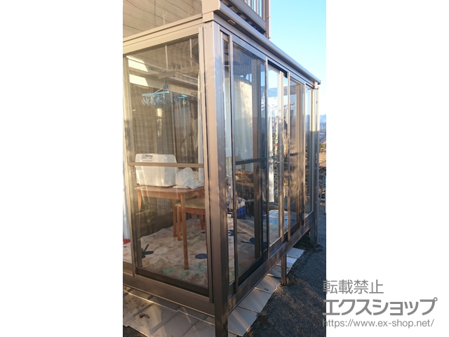 長野県下伊那郡松川町のLIXIL リクシル（トステム）のテラス囲い・サンルーム ほせるんですII R型 床納まり ランマ無 積雪〜20cm対応 施工例